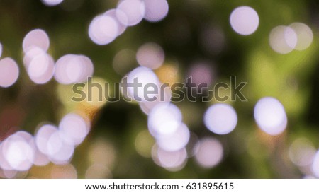 bokeh of leaves and sunlight on green and black background. Dimension sphere bokeh
