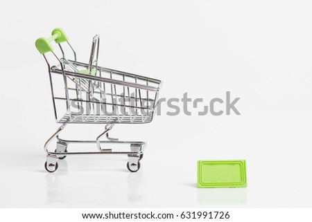 A small supermarket grocery push cart for shopping isolated white on background. Sale buy mall market shop consumer concept. 