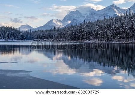 Evening Reflections of Snow Capped Mountains on Herbert Lake, Icefields Parkway