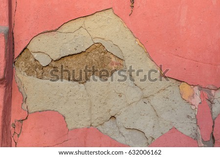 Cracked red cement plaster texture