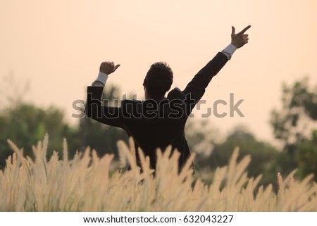Happy business with reeds grass background