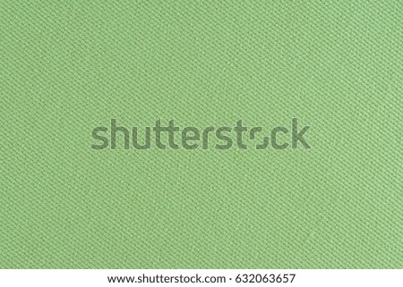 Green fabric texture background. Abstract background, empty template. 
