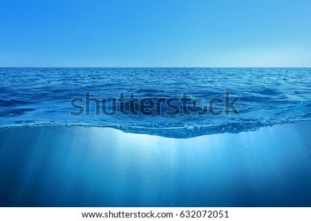 Abstract design of tropical sea water split line with underwater and sky Royalty-Free Stock Photo #632072051