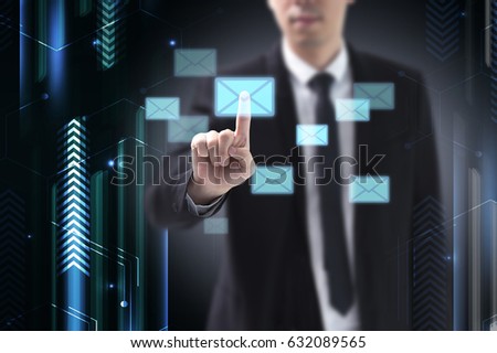 Futuristic businessman using digital screen selecting Modern communication email.