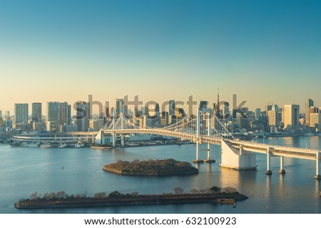 View of Tokyo Bay, Rainbow bridge and Tokyo Tower landmark, Twilight scene, Odaiba, Japan