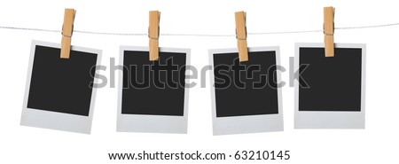 old photo frame attach to rope clothes peg over white background