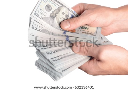 Dollars in man hand isolated on white