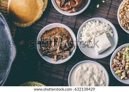 Top View : Nuts, cheese , spices ready for cooking. Stylish image for social media