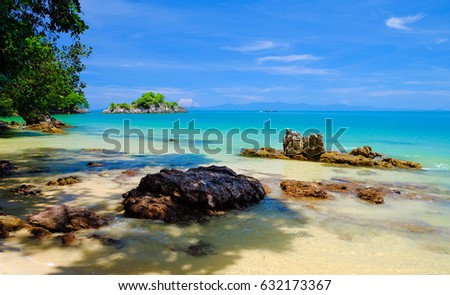 Tropical beach seaside and blue sky at Koh Phayam Island of Ranong,Thailand Royalty-Free Stock Photo #632173367
