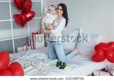 Happy loving family. mother and child girl playing, kissing and hugging. Happy mother's day!