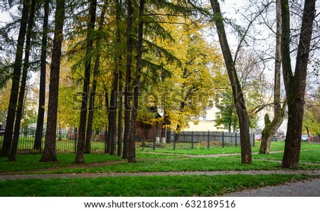 Autumn trees at the central park in Sergiev Posad, Russia. Sergiev Posad is famous for its monastery, the spiritual home of the Orthodox Church.