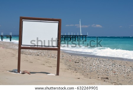 information board on the beach