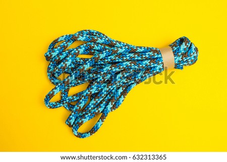 A new rope on a yellow background.
