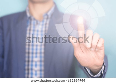 An empty virtual touchpad for managing anything. A man with his finger manages the touch interface.