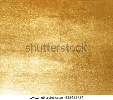 Shiny yellow leaf gold foil texture background Royalty-Free Stock Photo #632453924