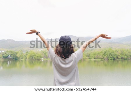 Woman feel happy in outdoor background