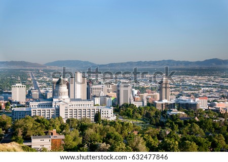 Skyline of Salt Lake City Utah with the Utah State Capitol Building and the historic Salt Lake Temple of the Church of Jesus Christ of Latter-day Saints (the Mormons)