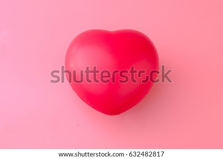  red heart on Pink background, copy space.
