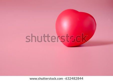  red heart on Pink background, copy space.