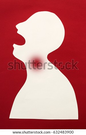 concept of human disease diagnosis and pain localization on silhouette - contour of abstract male man with opened mouth and sore spot in the throat, isolated on red background, top view, flat lay