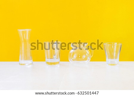 Set dishes on the yellow background.