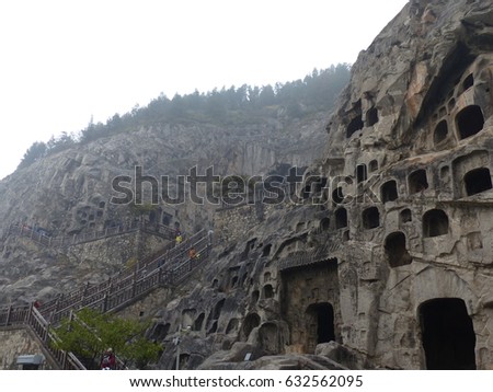 Luoyang / Longmen grottoes / picture showing the caves and sculptures in the limestone grottoes of Luoyang (Longmen Grottoes), China. Taken in October 2015.