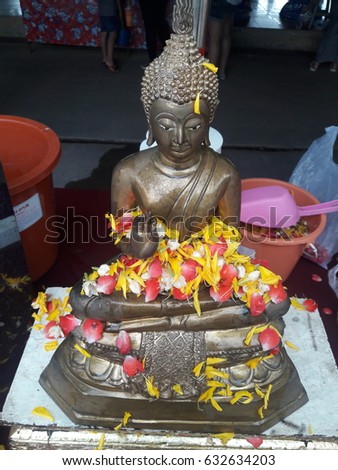 Bathing the Buddha in thailand - The ritual of bathing the Buddha is conducted every year on Buddha's birthday