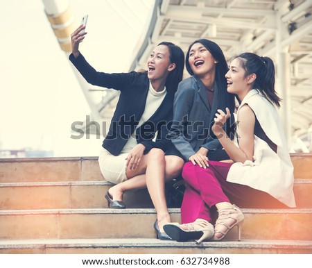 Lifestyle sunny best friend girls taking selfie on camera, crazy emotions , happy vacations, shopping day. Wearing elegant dress.