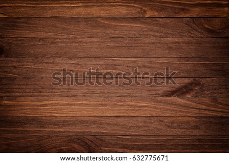 Dark brown wooden background with high resolution. Top view Copy space Royalty-Free Stock Photo #632775671