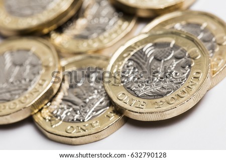 New one pound British sterling coin. Royalty-Free Stock Photo #632790128