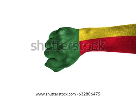 Fist painted in color Benin flag, hand isolated on white background.