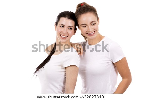 young casual caucasian women wearing white tshirt and blue jeans on white isolated background