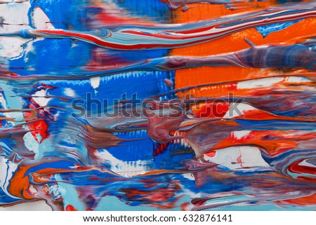 Liquid abstract paint background. Fluid painting texture. Colorful mix of acrylic vibrant colors.