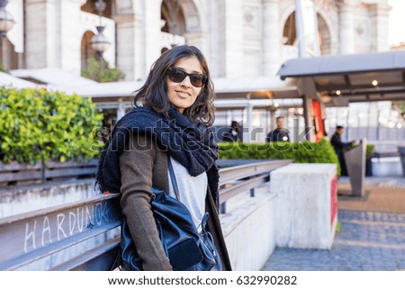 young woman happy in the city