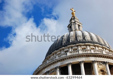 The top section of St Paul's Cathedral in London with sky.