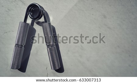 metal Hand expander on a white background.