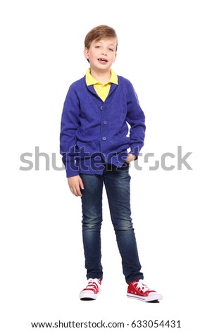 Happy boy in front of a white background