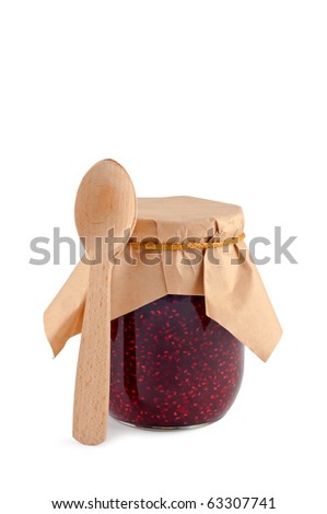 Jam in jar, wooden spoon, isolated on white, shade below.