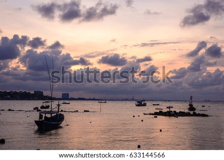 fishing boat on sea in the morning sunset at Phala beach Rayong sunset background