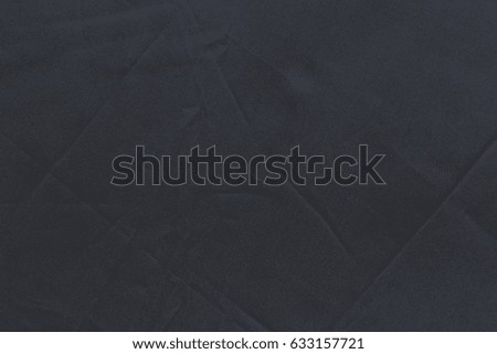 Texture of black fabric for background design.