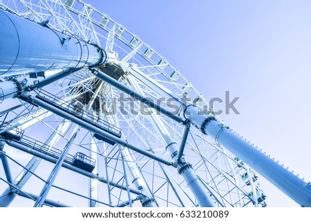 Ferris wheel in Malaga in blue tones