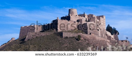 Day photo of old medieval castle. Castle of Cardona. Catalonia, Spain