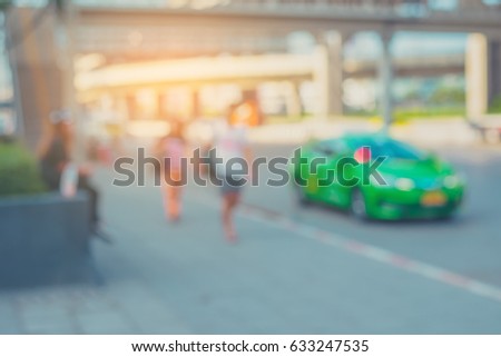vintage tone image of blur car on road in evening for background usage .