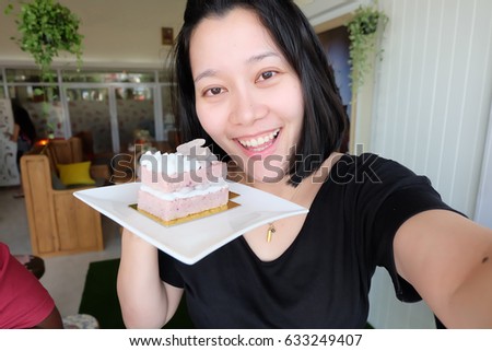 selfie Thai woman with cake, self portrait