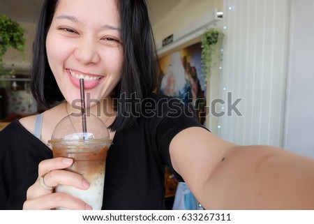 selfie Thai woman with coffee, self portrait