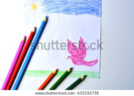 A child's drawing of a pink dove, grass and sky with colored pencils.