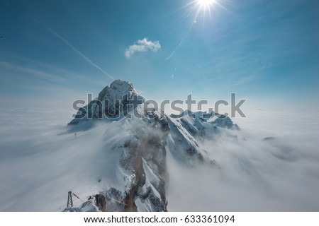 Observation deck at Dachstein/Hunerkogel mountain glacier in the Alps located at Steiermark, Austria. Image of the Stairway to Nothingness on the top of the Dachstein Mountain.  Royalty-Free Stock Photo #633361094