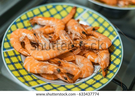 Shrimp seafood prawns dinner meal cooking home kitchen plate dish stove background