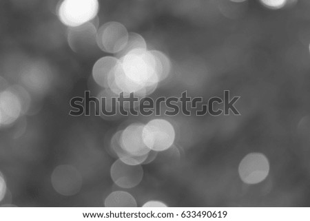 Blur gray leaves with bokeh, abstract background