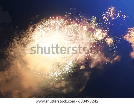 fireworks of bright red against the blue black sky
